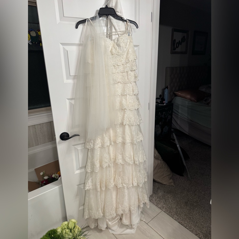 Elegant Cream Ruffled Gown